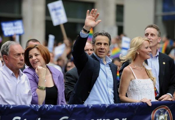 New York State Governor Andrew Cuomo walks with