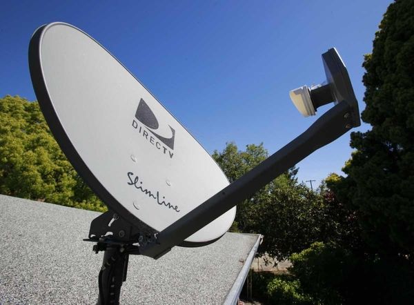 A DirecTV satellite dish is attached to a