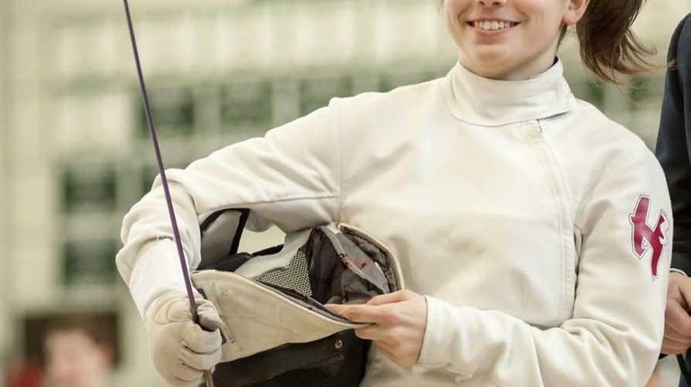 Whitman's Alexandria Alpy competes in the Suffolk fencing championships at...