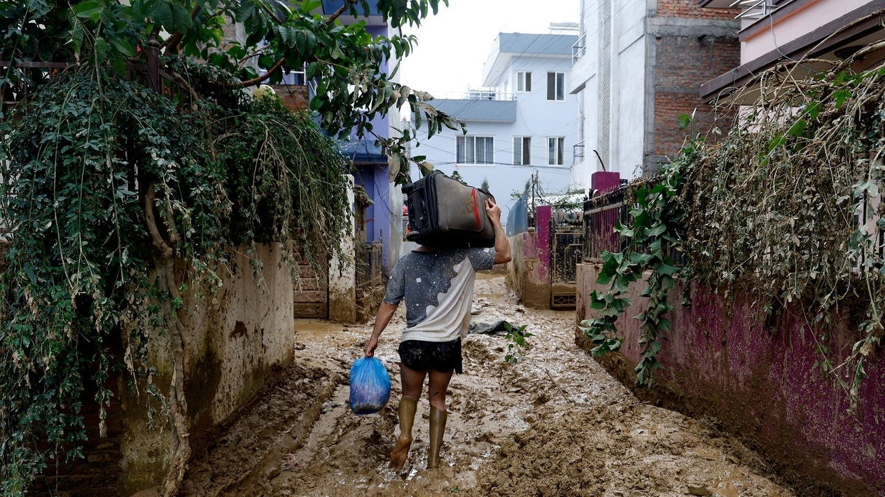 Rescuers search for missing people in Nepal following flooding and ...