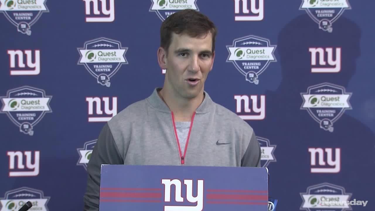 Giants fan burns Eli Manning jersey 