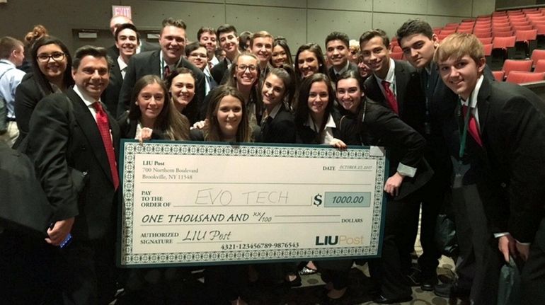 Patchogue-Medford High School's EvoTech firm took first place and won...