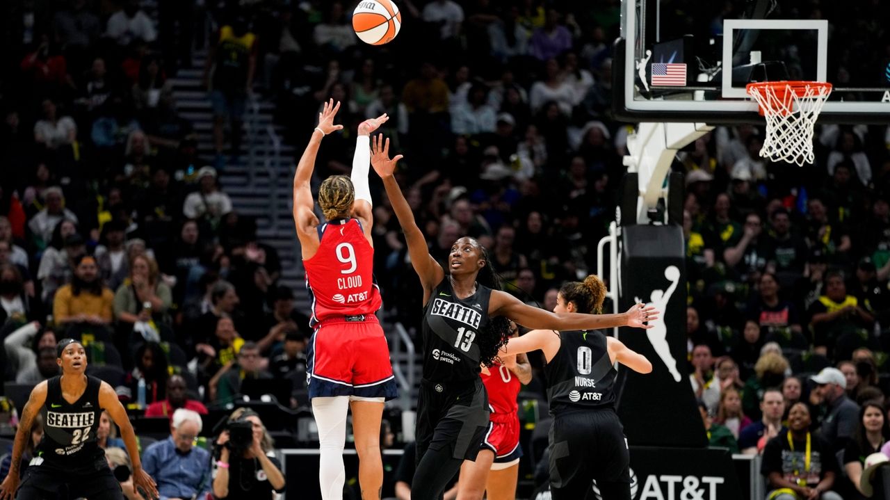 Cloud, Atkins help Mystics turn back late Storm rally on day Bird honored in Seattle