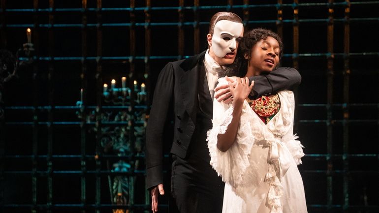 Ben Crawford as The Phantom and Emilie Kouatchou as Christine...