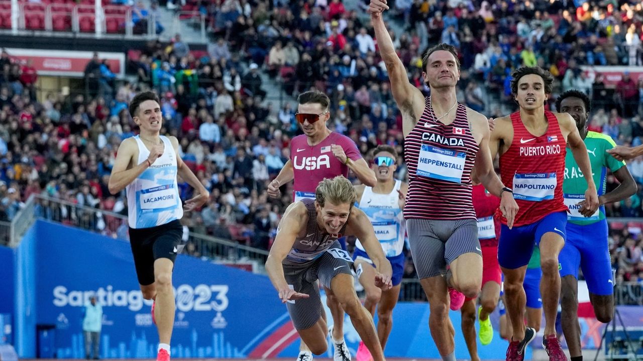 Diving runner wins Canada's 1st track and field gold at Pan American
