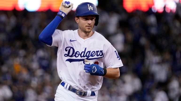 FILE - Los Angeles Dodgers' Trea Turner celebrates as he...