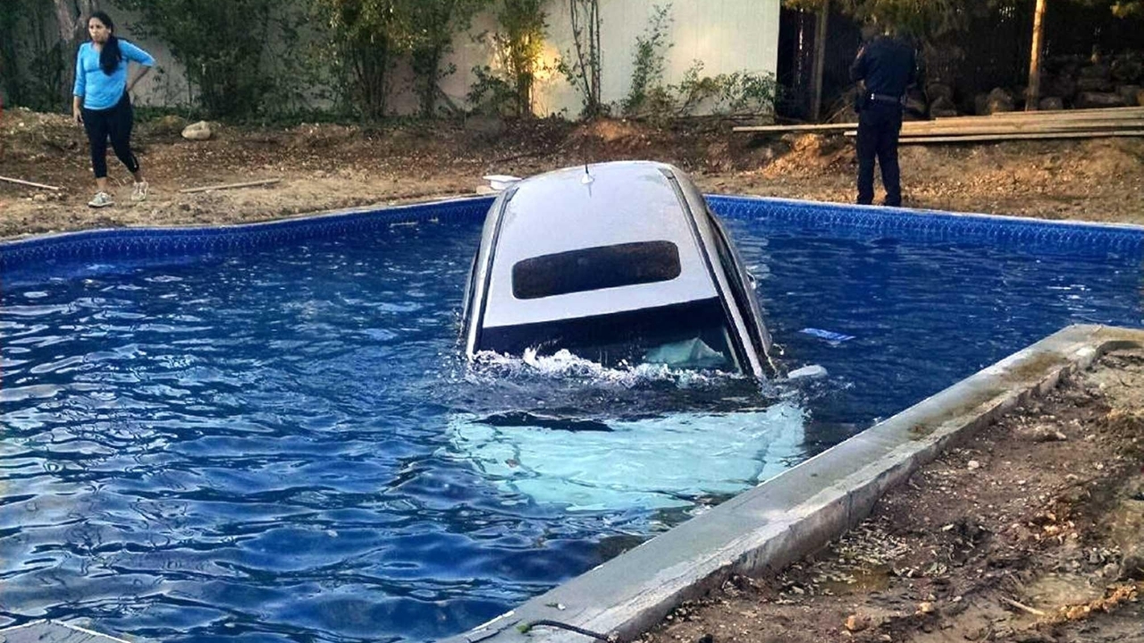 SUV crashes into new pool; homeowner saves driver - Newsday