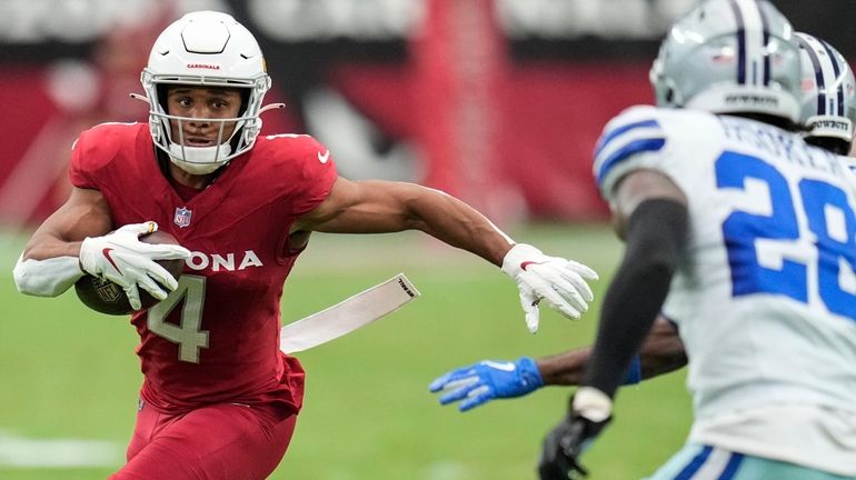 Arizona Cardinals wide receiver Rondale Moore (4) runs against Dallas...