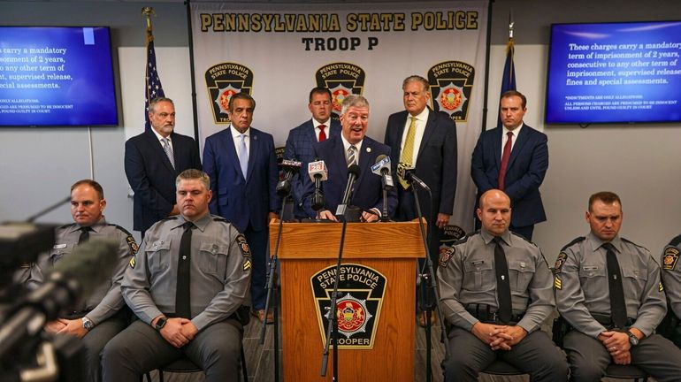 Pennsylvania Middle District U.S. Attorney Gerard Karam speaks at a...