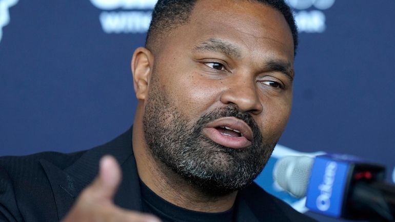 Newly-named New England Patriots head coach Jerod Mayo faces reporters,...