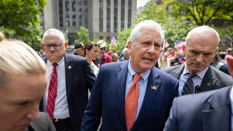 Nassau County Executive Bruce Blakeman, center, holds a rally in support of...