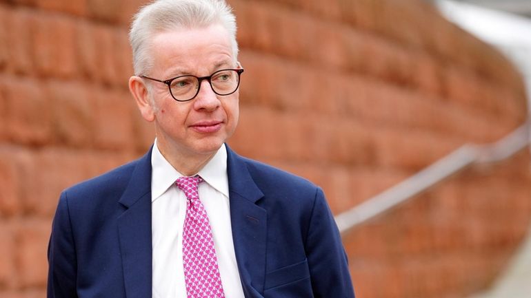 Then-Secretary of State Michael Gove arrives at the Conservative Party...