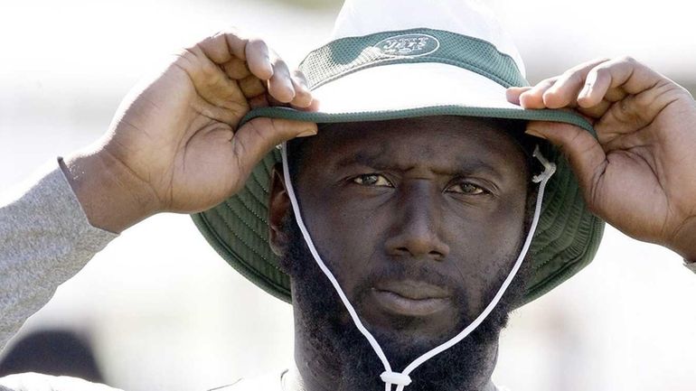 Jets defensive end Muhammad Wilkerson looks on during training camp...