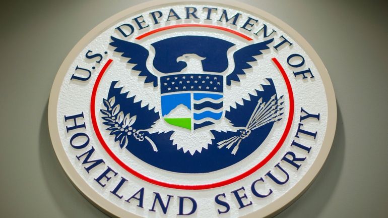 The Department of Homeland Security logo is seen during a...