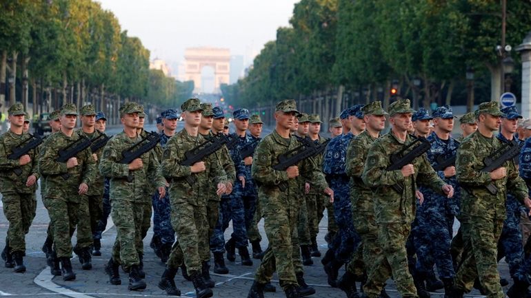 Army Forces of Croatia walk during the rehearsal of the...