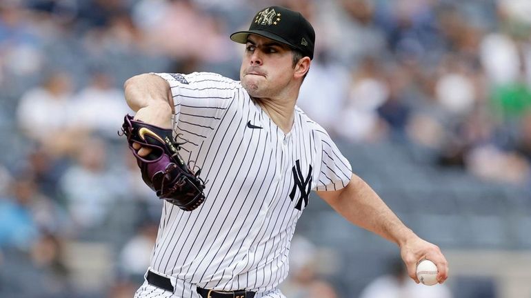 Carlos Rodon of the Yankees pitches during the first inning against...