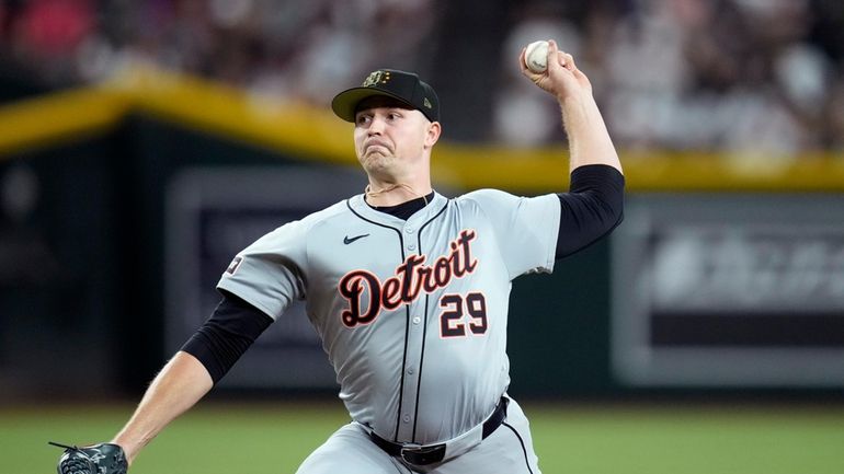 Detroit Tigers starting pitcher Tarik Skubal throws to an Arizona...