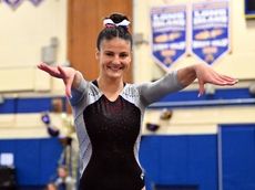 Middle Country's Hughes wins third straight Suffolk all-around gymnastics title