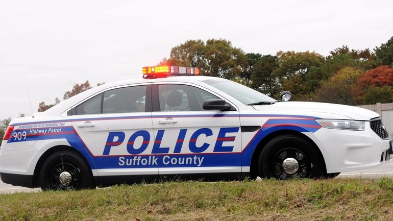 A new police cruiser pulls over a vehicle along the...