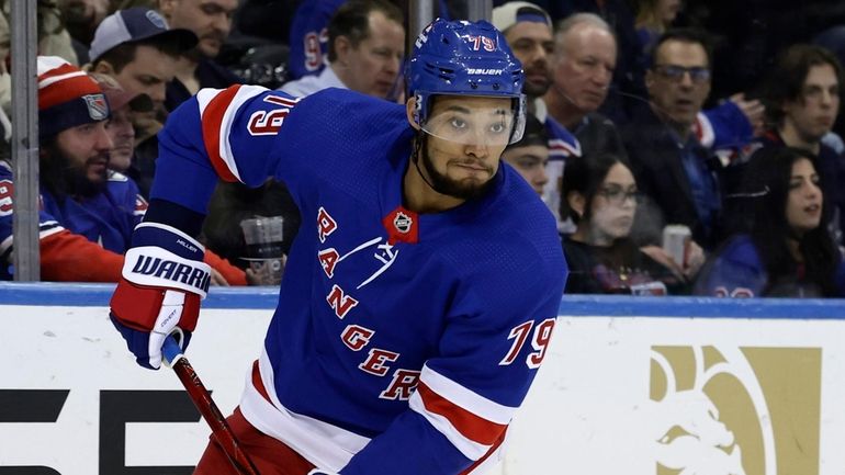 K'Andre Miller #79 of the Rangers skates against the Dallas Stars...