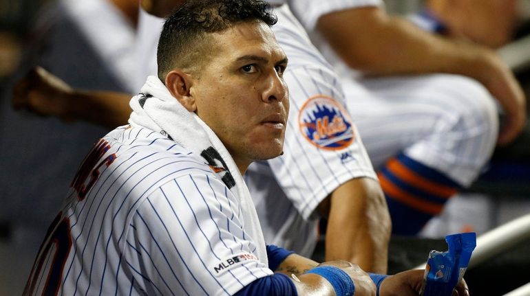 Wilson Ramos #40 of the New York Mets looks on...