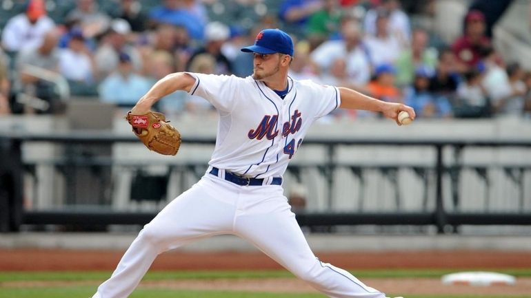 New York Mets pitcher Jonathon Niese (49) throws in the...