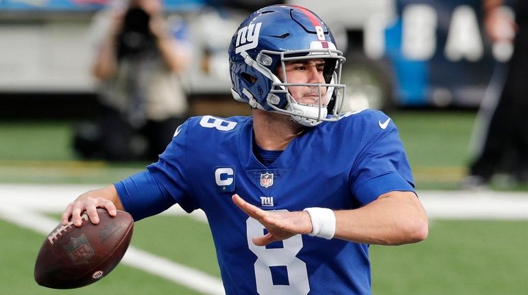 Daniel Jones of the Giants throws a pass during the first...