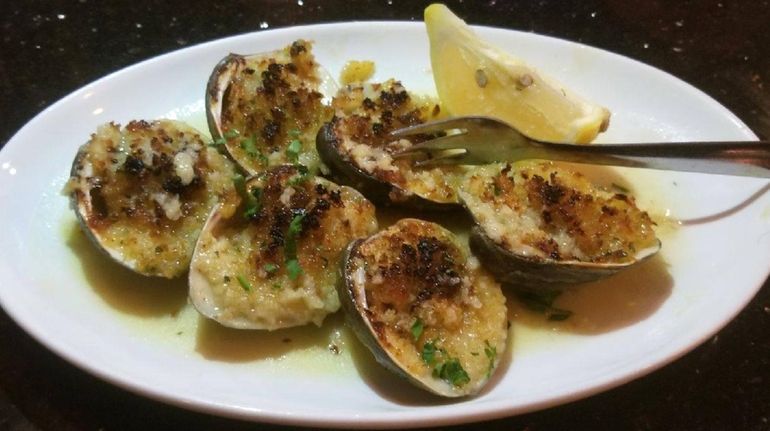 Baked clams are among the appetizers at Viaggio Italian Chop...