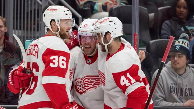 Detroit Red Wings right wing Daniel Sprong second from right,...