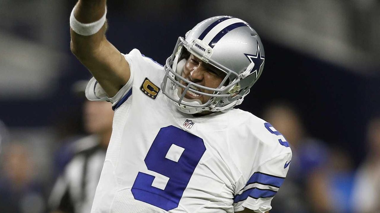 Dallas Cowboys Tony Romo throws a pass out of his own endzone in