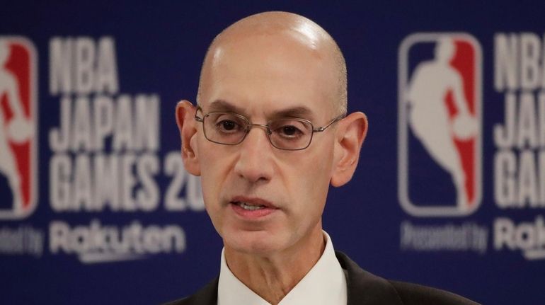 In this Oct. 8, 2019 file photo, NBA Commissioner Adam...