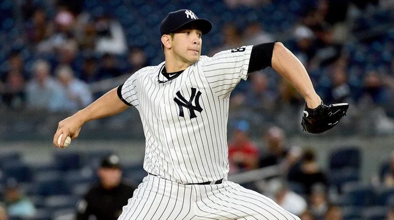 New York Yankees Pitcher Luis Cessa throws during the first...