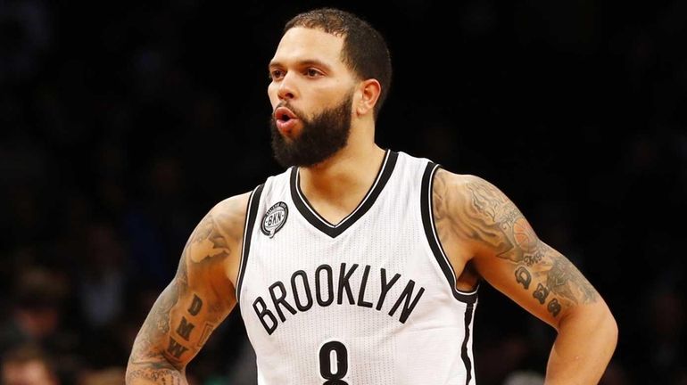 Deron Williams of the Brooklyn Nets looks on late in...