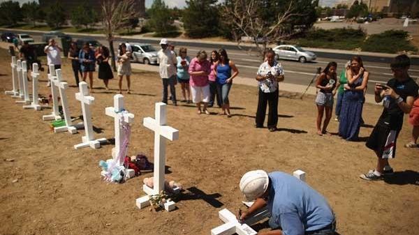 Greg Zanis made a makeshift memorial across the street from...