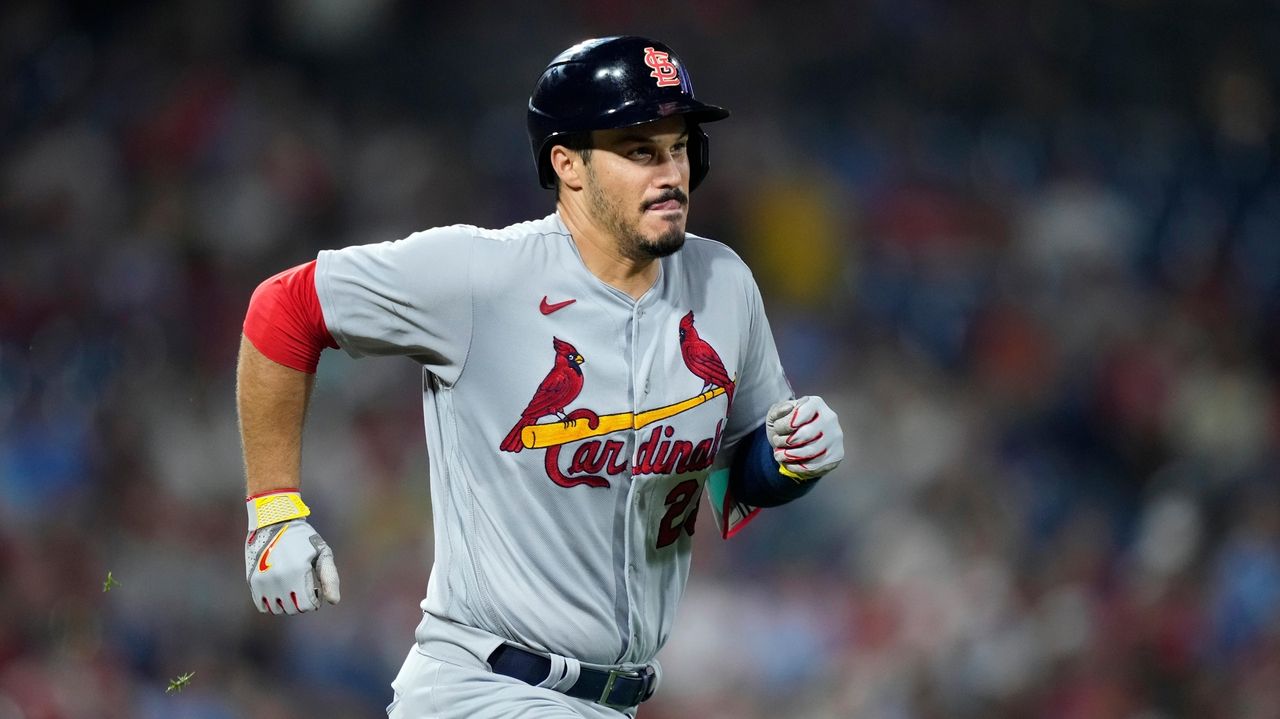 AP source says Nolan Arenado chooses to stay with the Cardinals