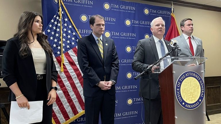 Arkansas Attorney General Tim Griffin speaks at a news conference...