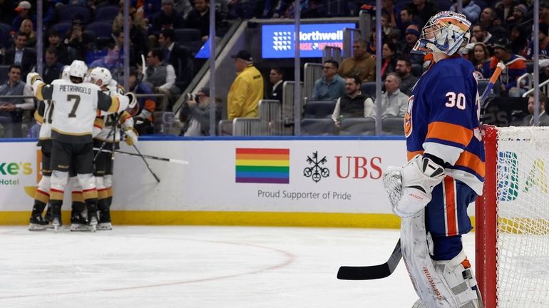 Ilya Sorokin of the Islanders looks on after surrendering a goal...