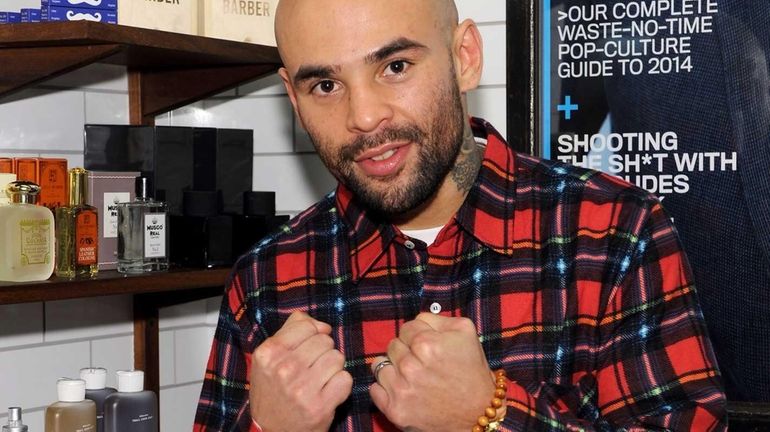 Boxer Luis Collazo attends GQ Barber Shop Grand Opening with...