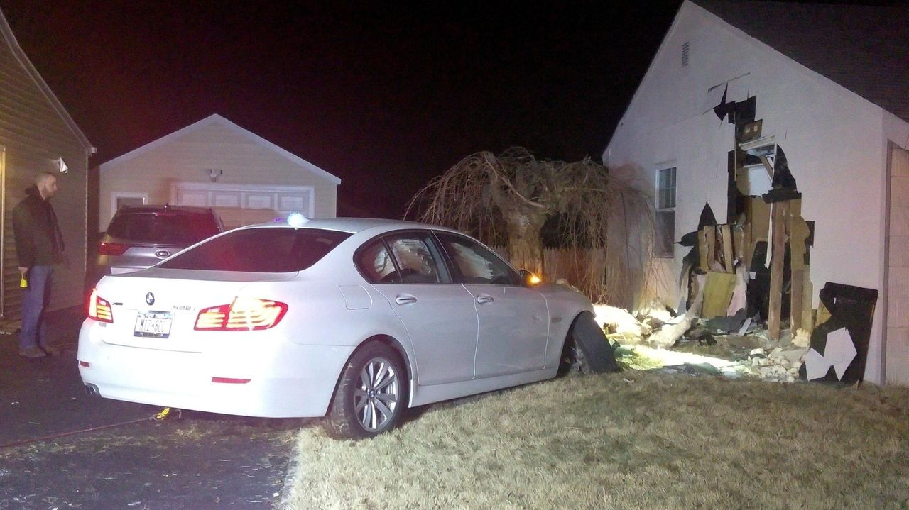 Car crashes into Bethpage house, driver hurt, cops say Newsday