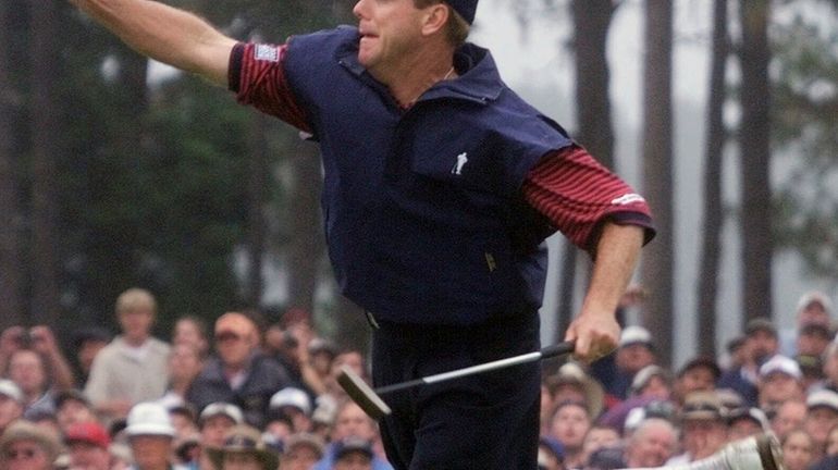 Payne Stewart celebrates after winning the U.S. Open golf championship...