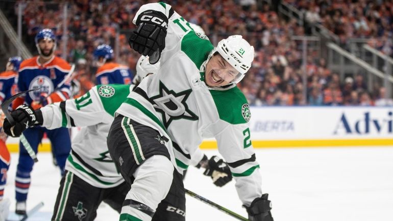 Dallas Stars left wing Jason Robertson (21) celebrates a goal...