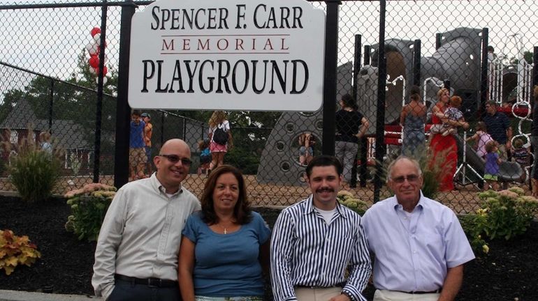 From left, family friend Ron Kaye, Alma Carr, 59, Christian...