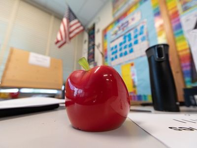 A plastic apple on a desk in George A. Jackson...