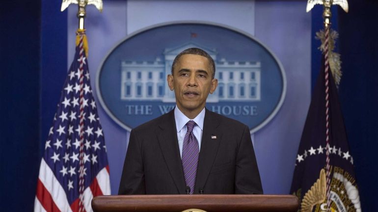 President Barack Obama speaks in the briefing room of the...
