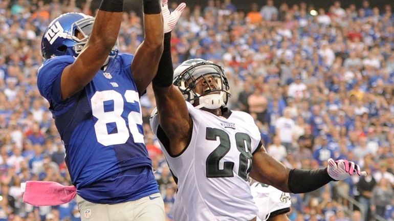 Giants wide receiver Rueben Randle (no. 82) catches a touchdown...