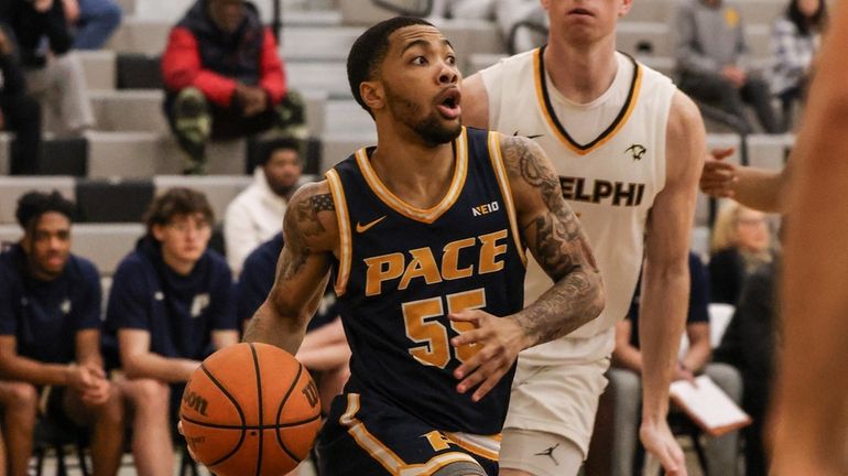 Tray Alexander of Pace drives to the hoop during a...