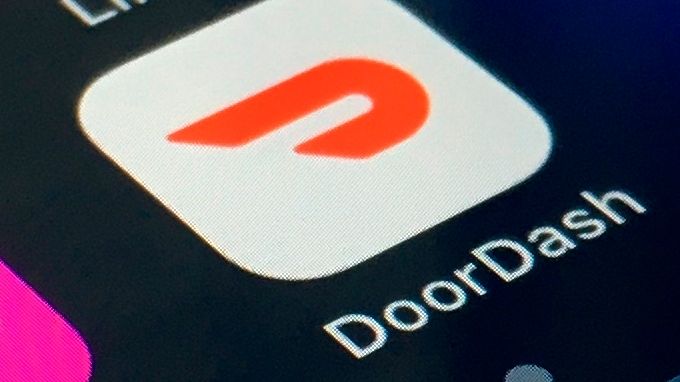 The DoorDash app is shown on a smartphone, Feb. 27,...