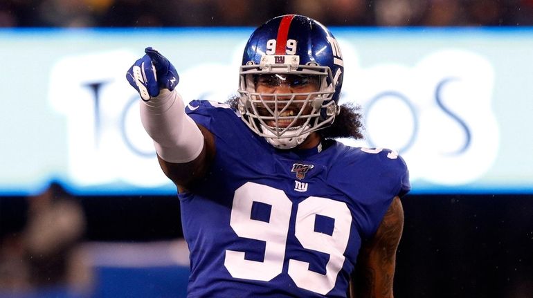 Leonard Williams of the Giants reacts after his sack in...