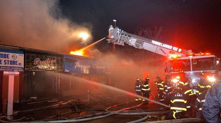 A fire destroyed more than a dozen storefronts on a...