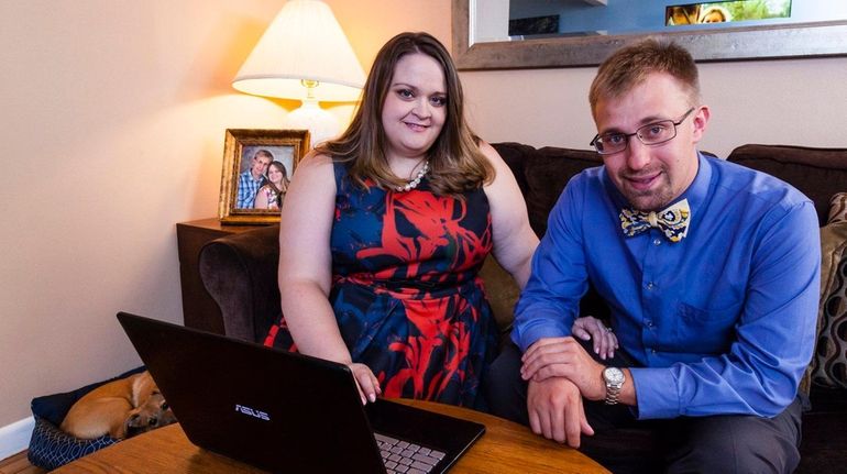 Jennifer Millard, 30, program manager, and her husband, Paul Enzinger,...